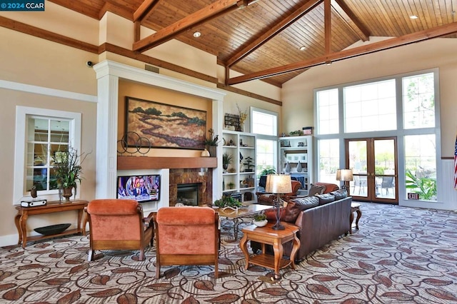 living room featuring beamed ceiling, french doors, high vaulted ceiling, and wood ceiling