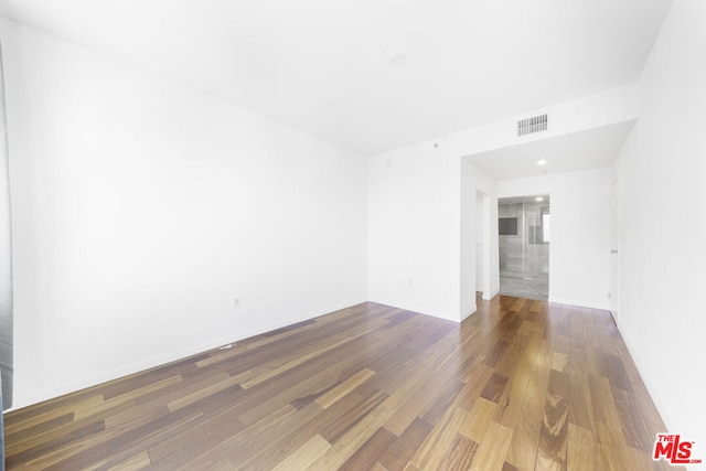 empty room featuring hardwood / wood-style floors