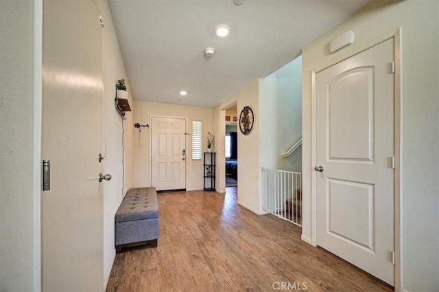 hall featuring wood-type flooring