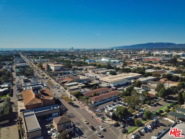 drone / aerial view featuring a mountain view