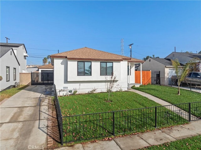 bungalow-style house with a front yard