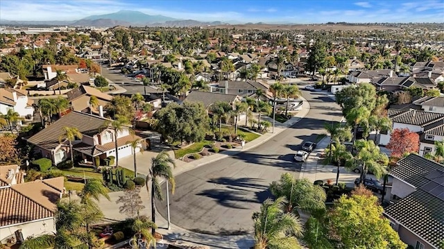 drone / aerial view featuring a mountain view