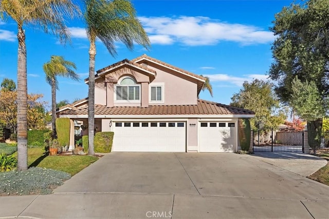 view of front of home with a garage