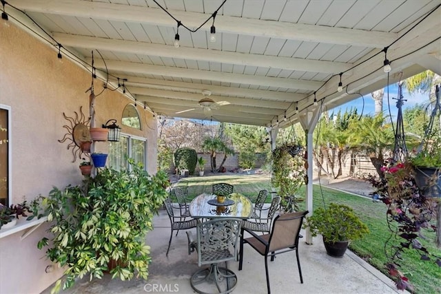 view of patio featuring ceiling fan