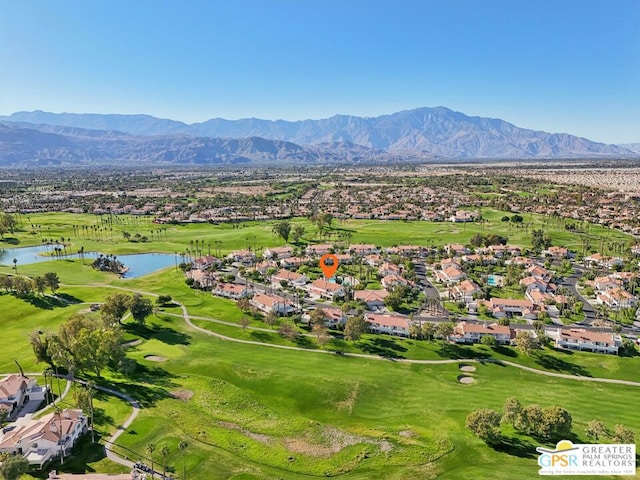 birds eye view of property featuring a water and mountain view