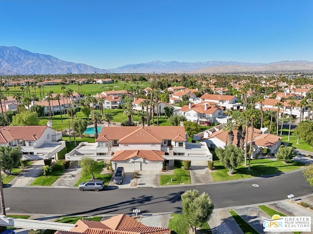 bird's eye view with a mountain view