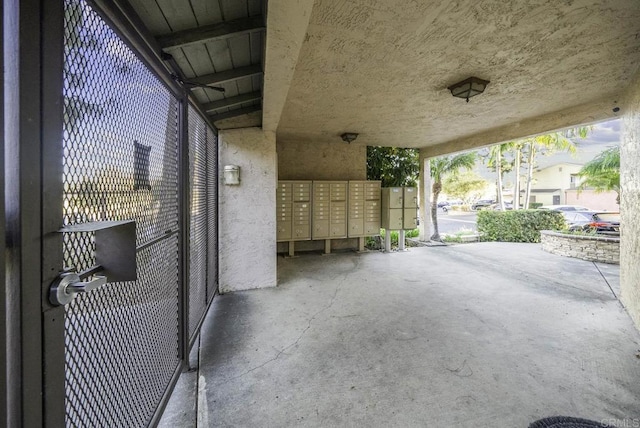 view of patio / terrace with a mail area