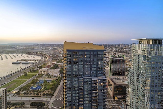 property's view of city featuring a water view