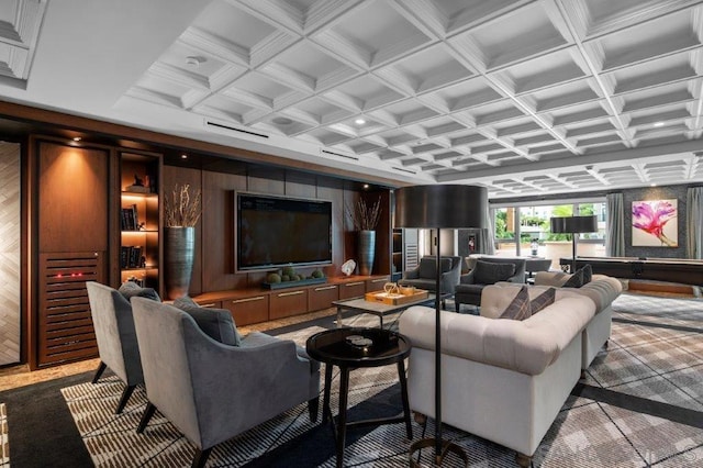 living room featuring beamed ceiling and coffered ceiling