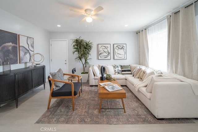 living room featuring ceiling fan