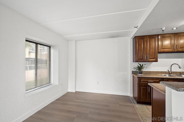 kitchen featuring sink and light hardwood / wood-style flooring