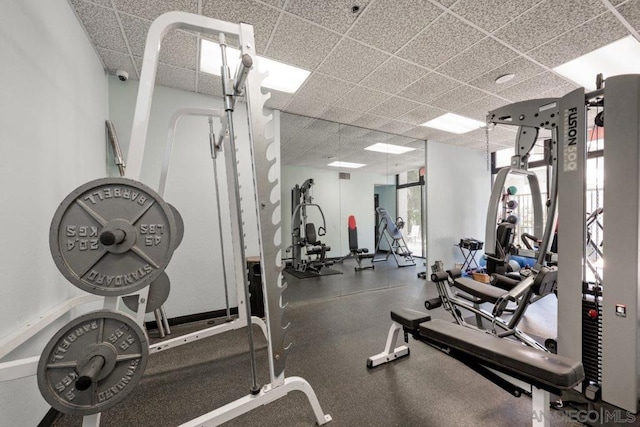 workout area with a drop ceiling