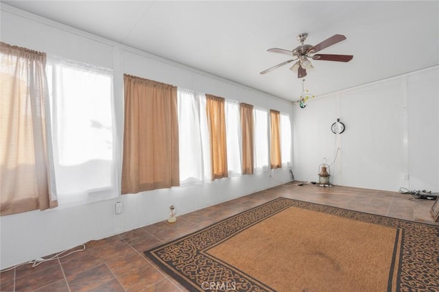 spare room with ceiling fan