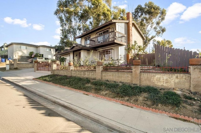 view of front of property with a balcony