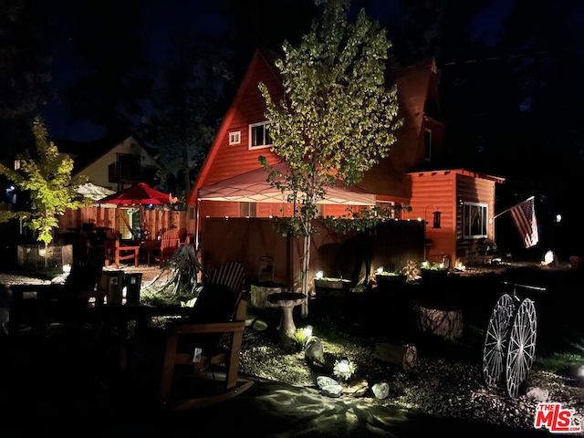 view of yard at night