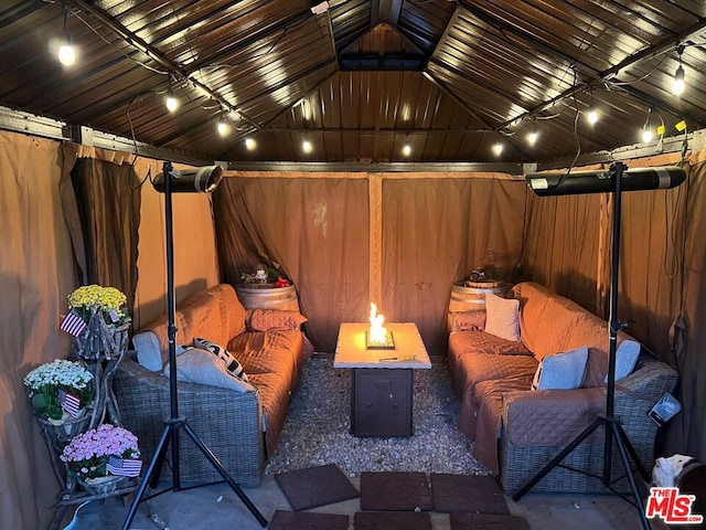 view of patio / terrace with an outdoor fire pit