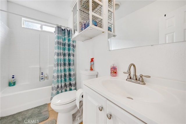 full bathroom featuring tile patterned floors, shower / bathtub combination with curtain, vanity, and toilet