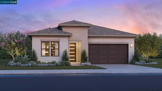 view of front of home featuring a garage