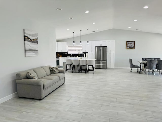 living room with lofted ceiling