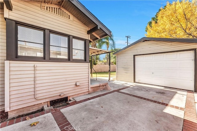 view of side of property with a garage