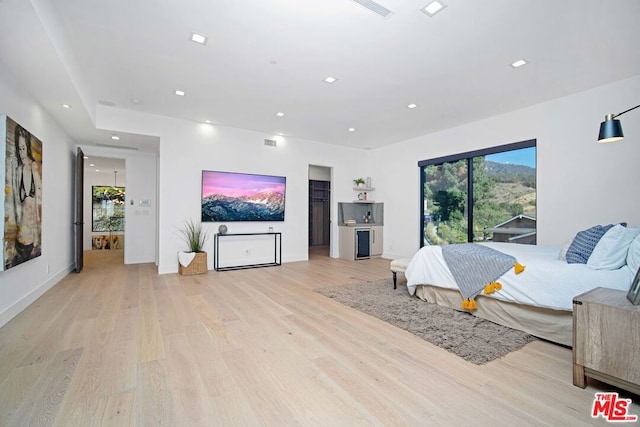 bedroom with light wood-type flooring