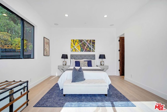 bedroom featuring light hardwood / wood-style floors