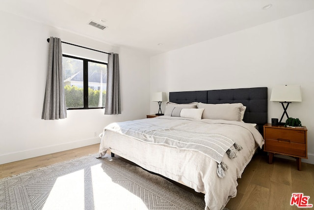 bedroom featuring light hardwood / wood-style flooring