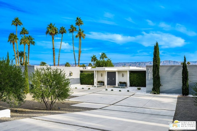 view of front of property with a mountain view