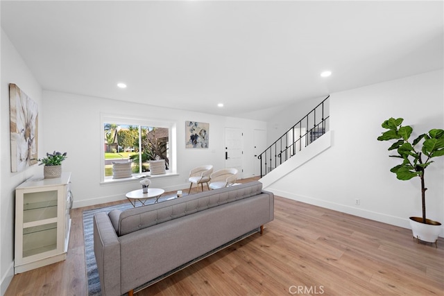 living room with light hardwood / wood-style floors