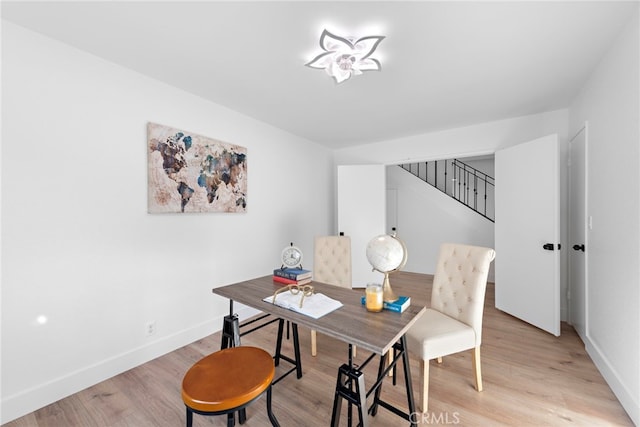 dining room with light wood-type flooring