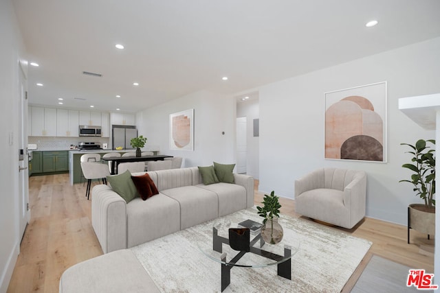 living room with light hardwood / wood-style floors