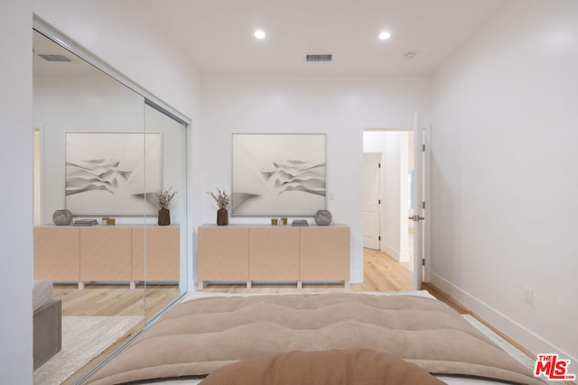 hallway featuring light hardwood / wood-style flooring