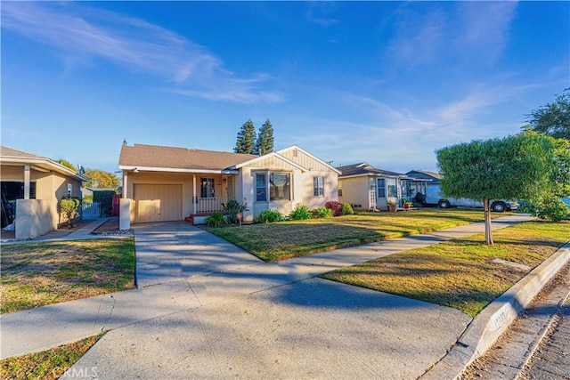 ranch-style home with a front lawn and a garage