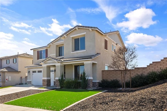 view of front facade with a front lawn and a garage