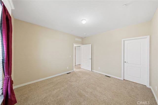 unfurnished bedroom with light carpet