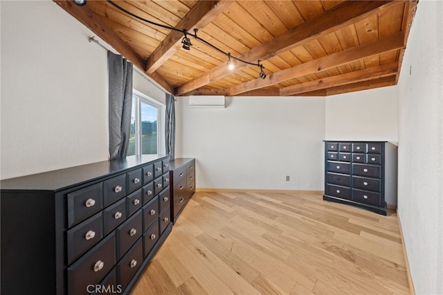 bedroom featuring light hardwood / wood-style floors, a wall mounted AC, wood ceiling, and beam ceiling