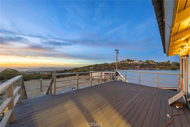 view of deck at dusk