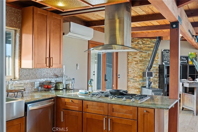 kitchen featuring island exhaust hood, a wood stove, stainless steel appliances, wooden ceiling, and decorative backsplash