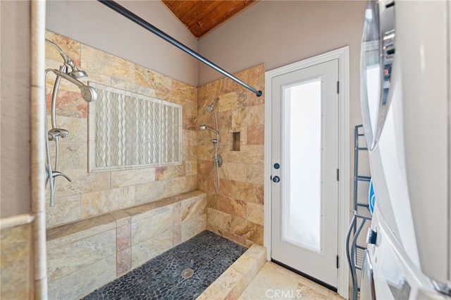 bathroom with tiled shower