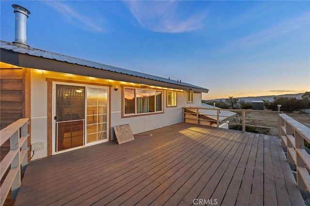 view of deck at dusk