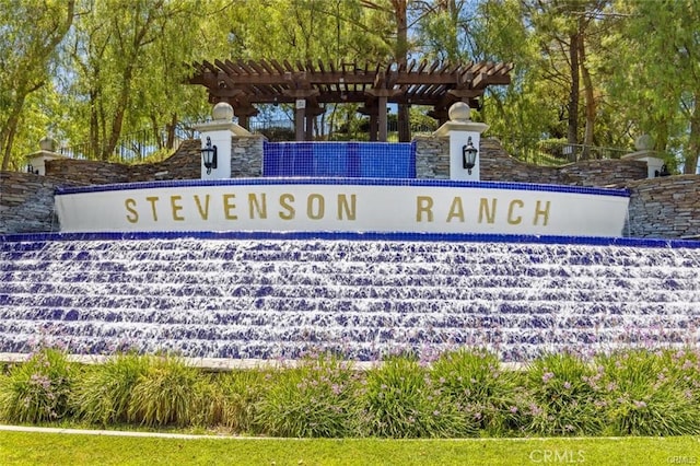 view of community sign