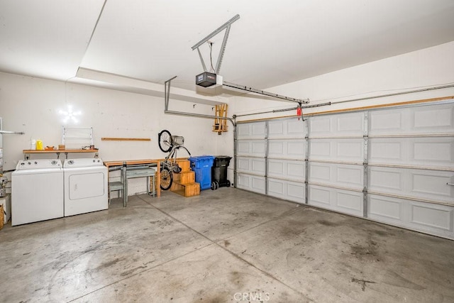 garage featuring a garage door opener and washer and clothes dryer