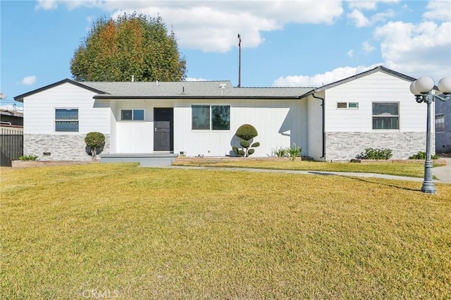 ranch-style house with a front yard