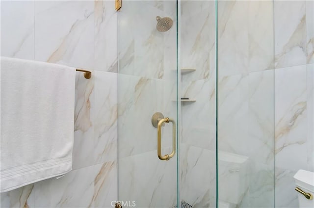 interior details featuring walk in shower