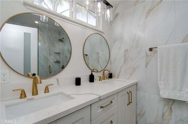 bathroom featuring vanity, walk in shower, and tile walls