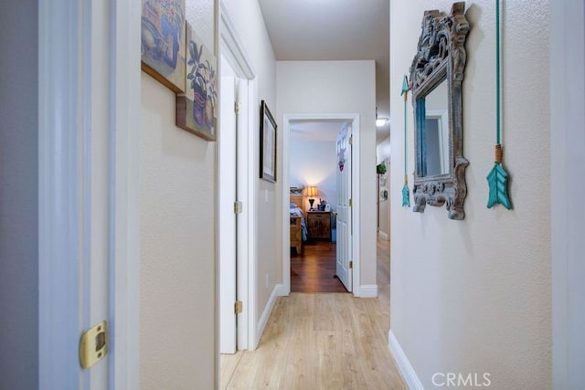 hallway featuring light hardwood / wood-style floors