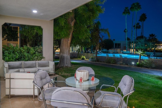 patio at twilight with a lawn