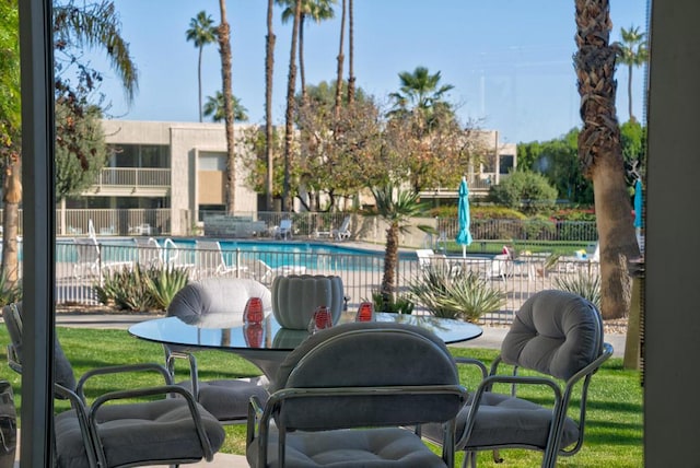 view of pool featuring a patio