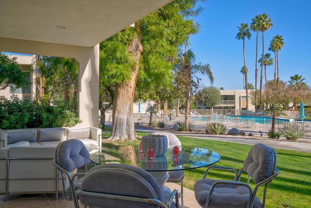 view of patio with a community pool