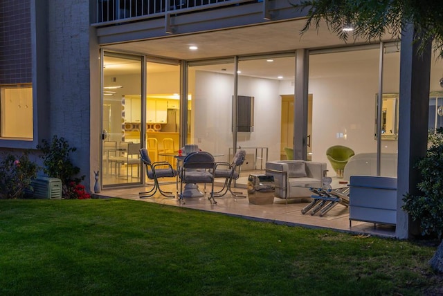 view of patio featuring a balcony